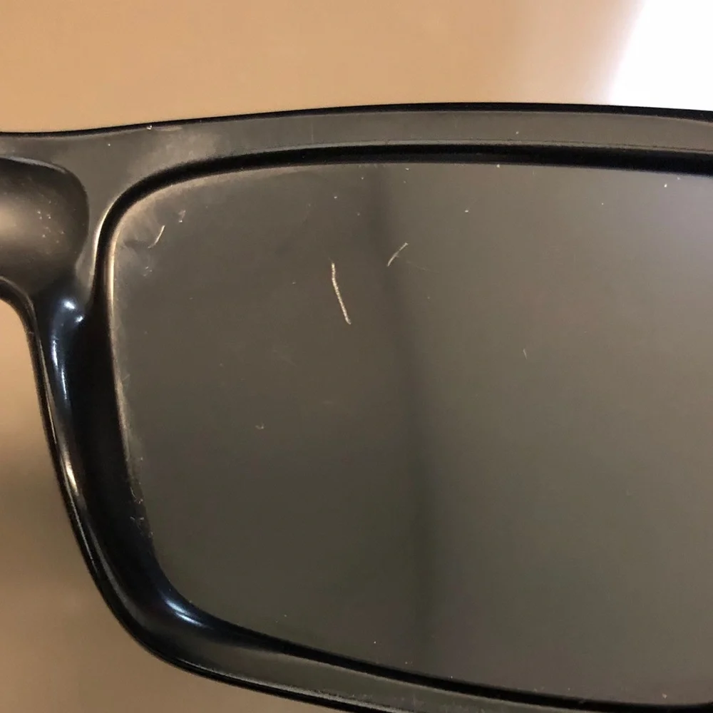 Oakley Black Fuel Cell Sunglasses black frames grey polarized lenses